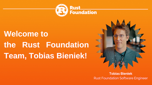 [Heading] Welcome to the Rust Foundation Team, Tobias Bieniek! (Headshot of Tobias appears in a zig-zag, circular frame to the right with the caption “Tobias Bieniek, Rust Foundation Software Engineer” below)